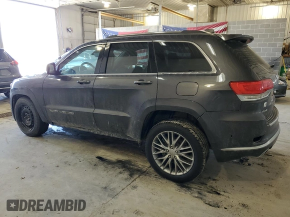 2017 Jeep Grand Cherokee Summit with VIN 1C4RJFJT4HC723876, listed as a Copart auction lot 52647205 with 97,412 mi miles and Salvage title. Bid and sale history available at DreamBid. Image 2.