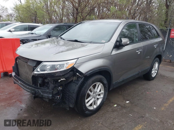 2014 Kia Sorento LX with VIN 5XYKT3A67EG477367, listed as a IAAI auction lot 41911249 with 172,320 mi miles and . Bid and sale history available at DreamBid. Image 19.
