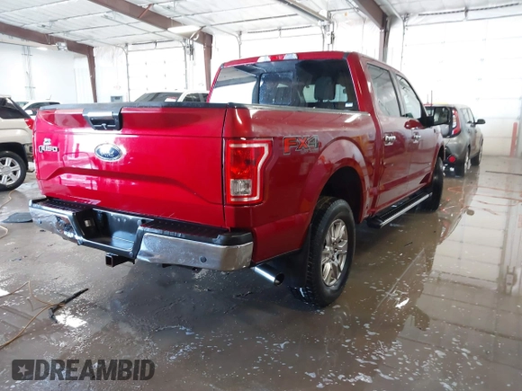 2016 Ford F-150 XLT with VIN 1FTEW1EG7GKF67577, listed as a IAAI auction lot 41612450 with 123,573 mi miles and . Bid and sale history available at carsss.com. Image 4.