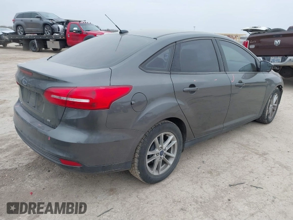 2018 Ford Focus SE with VIN 1FADP3F29JL269000, listed as a IAAI auction lot 41630271 with 75,073 mi miles. Bid and sale history available at carsss.com. Image 4.