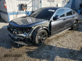 2024 Honda Civic Sedan Touring with VIN 2HGFE1F92RH325802, listed as a Copart auction lot 43206405 with 22,850 mi miles and Salvage Title. Bid and sale history available at carsss.com. Image 1.