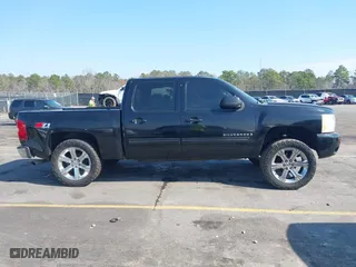 2009 Chevrolet Silverado 1500 LTZ with VIN 3GCEK33389G167139, listed as a IAAI auction lot 41490632 with 221,604 mi miles. Bid and sale history available at carsss.com. Image 13.
