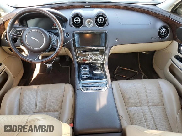 2014 Jaguar XJ with VIN SAJWA1CZ3E8V69877, listed as a Copart auction lot 48159005 with 57,567 mi miles and Clean Title. Bid and sale history available at DreamBid. Image 8.