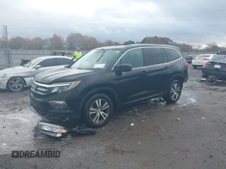 2016 Honda Pilot EX-L with VIN 5FNYF5H56GB031831, listed as a IAAI auction lot 41111342 with 244,197 mi miles and . Bid and sale history available at DreamBid. Image 17.