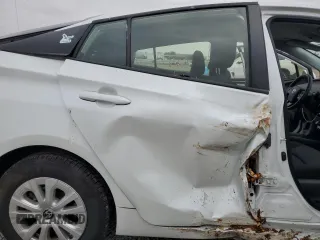 2021 Toyota Prius L Eco z VIN JTDKAMFU6M3140307, wystawiony jako Copart lot #58436795 z przebiegiem 53 151 mil mil oraz Szkoda całkowita • Salvage title. Historia ofert i sprzedaży dostępna na DreamBid. Obrazek 10.