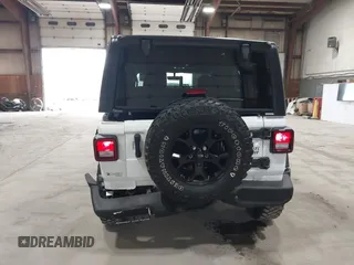 2023 Jeep Wrangler Sport S with VIN 1C4HJXDN2PW632584, listed as a IAAI auction lot 41965191 with 20,288 mi miles and . Bid and sale history available at DreamBid. Image 18.