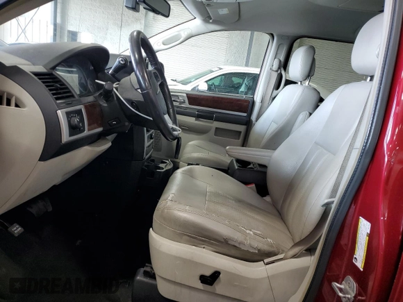 2010 Chrysler Town & Country Touring Plus with VIN 2A4RR8DX1AR427546, listed as a Copart auction lot 68314214 with 188,510 mi miles and Salvage Title. Bid and sale history available at DreamBid. Image 7.