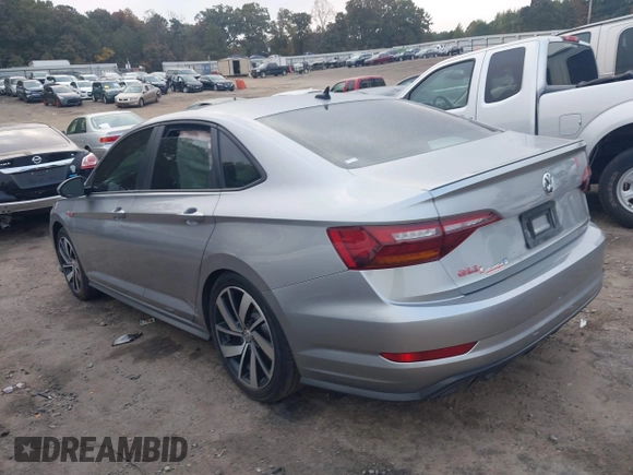2019 Volkswagen Jetta GLI S z VIN 3VW5T7BU4KM165083, wystawiony jako IAAI lot #40729763 z przebiegiem 75 414 mil mil oraz . Historia ofert i sprzedaży dostępna na DreamBid. Obrazek 3.