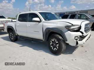 2017 Toyota Tacoma SR5 z VIN 5TFCZ5AN1HX048104, wystawiony jako Copart lot #60883165 z przebiegiem 143 856 mil mil oraz Szkoda całkowita • Salvage title. Historia ofert i sprzedaży dostępna na DreamBid. Obrazek 4.