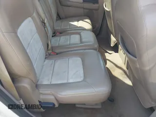2004 Ford Expedition Eddie Bauer with VIN 1FMPU17L64LB55970, listed as a IAAI auction lot 41883203 with 319,583 mi miles. Bid and sale history available at carsss.com. Image 8.
