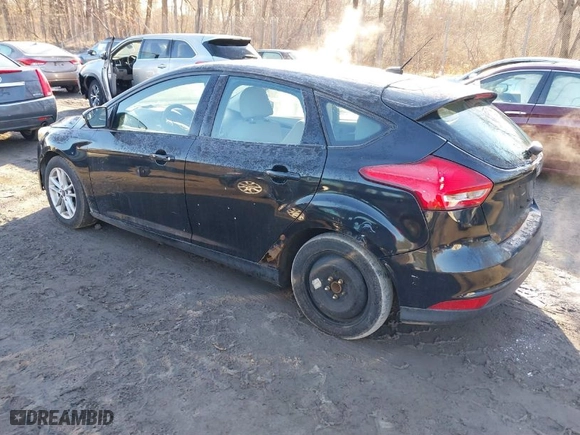 2015 Ford Focus SE with VIN 1FADP3K20FL213184, listed as a IAAI auction lot 41801065 with 151,824 mi miles. Bid and sale history available at carsss.com. Image 3.