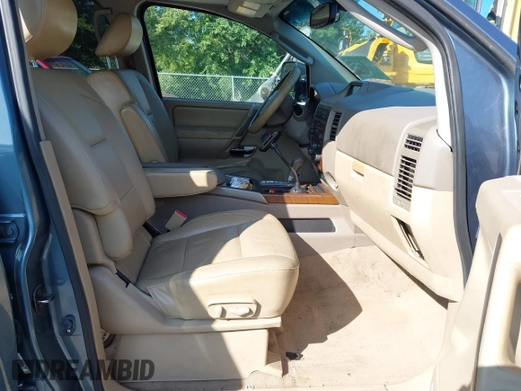 2011 Nissan Titan SL with VIN 1N6AA0EC7BN310833, listed as a IAAI auction lot 40140349 with 230,235 mi miles. Bid and sale history available at carsss.com. Image 5.