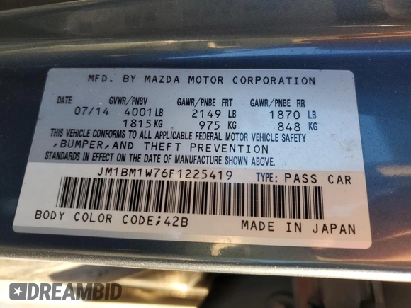 2015 Mazda 3 i Grand Touring z VIN JM1BM1W76F1225419, wystawiony jako Copart lot #74278093 z przebiegiem 102 059 mil mil oraz Szkoda całkowita • Salvage title. Historia ofert i sprzedaży dostępna na DreamBid. Obrazek 13.