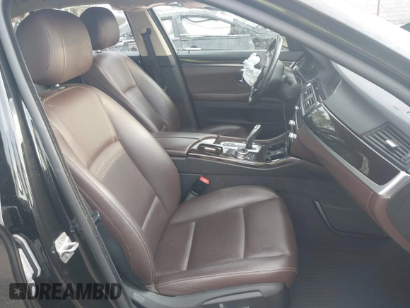 2014 BMW 5 Series 528i xDrive with VIN WBA5A7C52ED616976, listed as a IAAI auction lot 42067334 with 98,286 mi miles and . Bid and sale history available at DreamBid. Image 5.