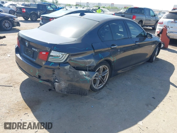 2014 BMW 5 Series 528i z VIN WBA5A5C59ED503028, wystawiony jako IAAI lot #42033479 z przebiegiem 93 335 mil mil oraz . Historia ofert i sprzedaży dostępna na DreamBid. Obrazek 4.