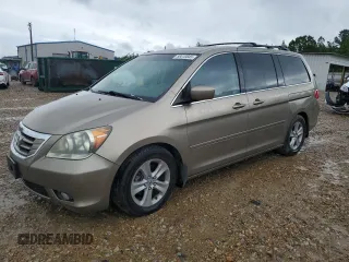 2010 Honda Odyssey Touring с VIN 5FNRL3H97AB082525, выставлен на аукционе Copart как лот 56410845 с пробегом 94 819 миль миль и Списание • Salvage title. История ставок и продаж доступна на DreamBid. Изображение 1.