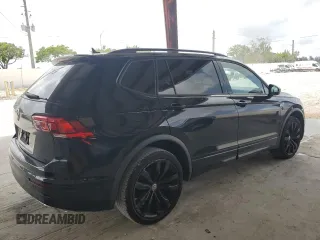 2021 Volkswagen Tiguan SE with VIN 3VV3B7AX4MM095257, listed as a Copart auction lot 60690015 with 61,782 mi miles and Salvage title. Bid and sale history available at DreamBid. Image 3.