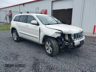 2011 Jeep Grand Cherokee Laredo with VIN 1J4RR4GG6BC680943, listed as a IAAI auction lot 42419575 with 188,672 mi miles and . Bid and sale history available at DreamBid. Image 1.