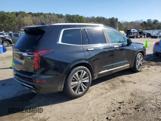 2021 Cadillac XT6 Premium Luxury z VIN 1GYKPCRS8MZ108761, wystawiony jako Copart lot #87185084 z przebiegiem 39 701 mil mil oraz Szkody całkowita. Historia ofert i sprzedaży dostępna na DreamBid. Obrazek 3.