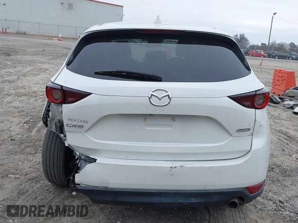 2017 Mazda CX-5 Touring with VIN JM3KFACL8H0205717, listed as a IAAI auction lot 41173725 with 107,604 mi miles. Bid and sale history available at carsss.com. Image 16.