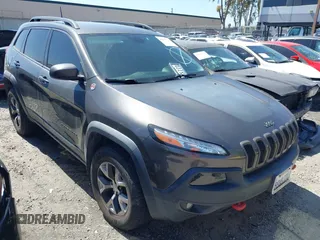 2018 Jeep Cherokee Trailhawk with VIN 1C4PJMBX0JD534722, listed as a IAAI auction lot 41557426 with 109,429 mi miles. Bid and sale history available at carsss.com. Image 1.