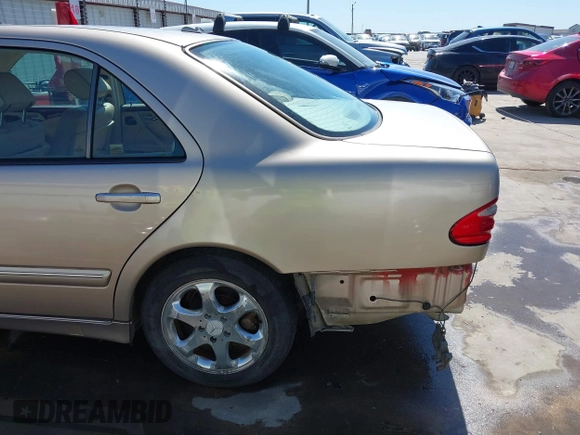 2002 Mercedes-Benz E-Class with VIN WDBJF65J42B394017, listed as a IAAI auction lot 41706917 with 188,883 mi miles. Bid and sale history available at carsss.com. Image 19.