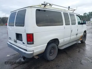 2008 Ford Econoline Passenger XL with VIN 1FBNE31LX8DA84628, listed as a IAAI auction lot 41670934 with 186,181 mi miles. Bid and sale history available at carsss.com. Image 4.