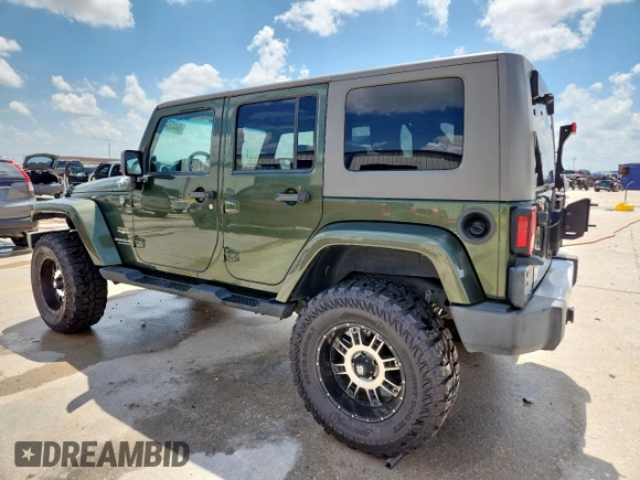 2008 Jeep Wrangler Unlimited Sahara with VIN 1J4GA59148L608970, listed as a Copart auction lot 64433495 with 134,055 mi miles and Salvage title. Bid and sale history available at DreamBid. Image 2.