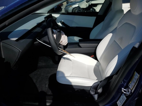 2025 Tesla Model 3 Long Range with VIN 5YJ3E1EA1SF887750, listed as a Copart auction lot 51348825 with 5,530 mi miles and Salvage Title. Bid and sale history available at DreamBid. Image 7.