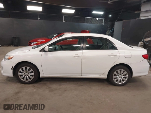 2012 Toyota Corolla L with VIN 2T1BU4EE2CC855849, listed as a IAAI auction lot 42040963 with 156,639 mi miles. Bid and sale history available at carsss.com. Image 14.