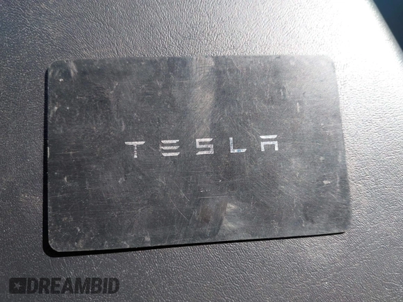 2023 Tesla Model 3 with VIN 5YJ3E1EA7PF447409, listed as a IAAI auction lot 41965416 with 40,033 mi miles and . Bid and sale history available at DreamBid. Image 11.