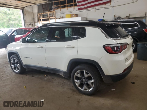 2018 Jeep Compass Limited with VIN 3C4NJDCB1JT212613, listed as a Copart auction lot 58320955 with 124,242 mi miles and Salvage title. Bid and sale history available at DreamBid. Image 2.