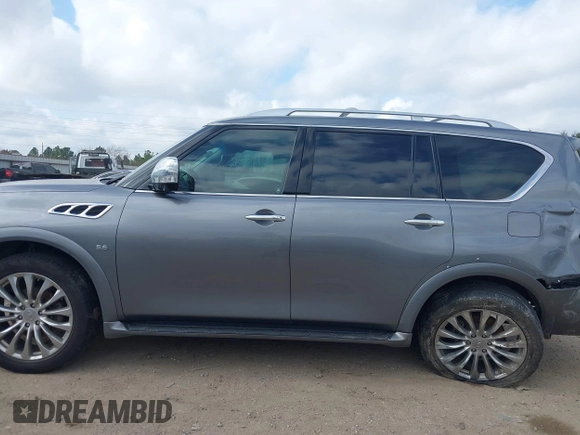 2015 Infiniti QX80 with VIN JN8AZ2NF5F9573634, listed as a IAAI auction lot 41510452 with 127,530 mi miles and . Bid and sale history available at DreamBid. Image 15.