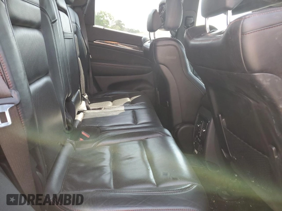 2019 Jeep Grand Cherokee Trailhawk with VIN 1C4RJFLG6KC838275, listed as a Copart auction lot 53002185 with 77,597 mi miles and Salvage title. Bid and sale history available at DreamBid. Image 11.