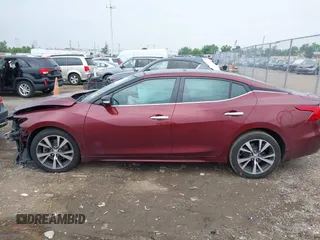 2016 Nissan Maxima SL with VIN 1N4AA6AP9GC401643, listed as a IAAI auction lot 42506704 with 103,197 mi miles and . Bid and sale history available at DreamBid. Image 15.
