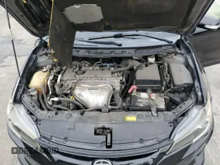 2015 Scion tC z VIN JTKJF5C75F3093123, wystawiony jako Copart lot #58414325 z przebiegiem 107 051 mil mil oraz Szkoda całkowita • Salvage title. Historia ofert i sprzedaży dostępna na DreamBid. Obrazek 11.