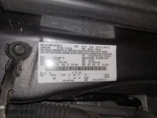 2014 Ford Focus SE with VIN 1FADP3F27EL153901, listed as a IAAI auction lot 41724290 with 141,036 mi miles. Bid and sale history available at carsss.com. Image 9.