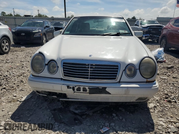 1999 Mercedes-Benz E-Class with VIN WDBJF65H0XA877630, listed as a Copart auction lot 69697454 with 0 mi miles and Salvage Title. Bid and sale history available at carsss.com. Image 5.