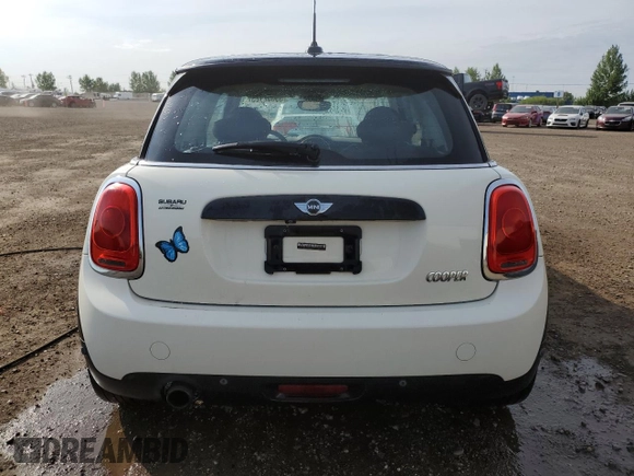 2016 MINI Hardtop with VIN WMWXP5C5XG2D15482, listed as a Copart auction lot 59652125 with 99,066 mi miles and Salvage title. Bid and sale history available at DreamBid. Image 6.