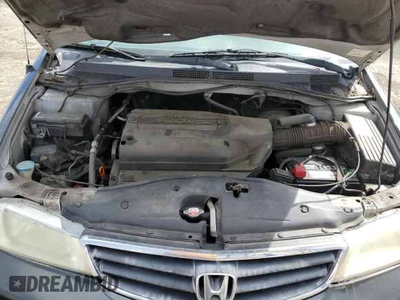 2004 Honda Odyssey EX-L with VIN 5FNRL18944B052617, listed as a Copart auction lot 51443625 with 144,346 mi miles and Salvage Title. Bid and sale history available at DreamBid. Image 14.
