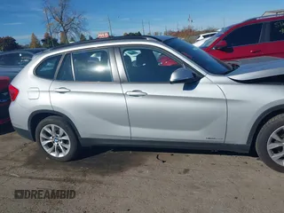 2013 BMW X1 xDrive28i z VIN WBAVL1C52DVR91900, wystawiony jako IAAI lot #40697726 z przebiegiem 115 200 mil mil oraz . Historia ofert i sprzedaży dostępna na DreamBid. Obrazek 13.
