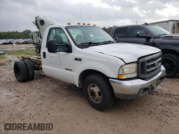 2004 Ford F-350 with VIN 1FDWF36P44EC05243, listed as a Copart auction lot 37153244 with 221,116 mi miles and Salvage title. Bid and sale history available at DreamBid. Image 4.