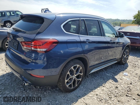 2021 BMW X1 xDrive28i with VIN WBXJG9C01M5T94314, listed as a Copart auction lot 60244134 with 43,933 mi miles and Salvage title. Bid and sale history available at DreamBid. Image 3.