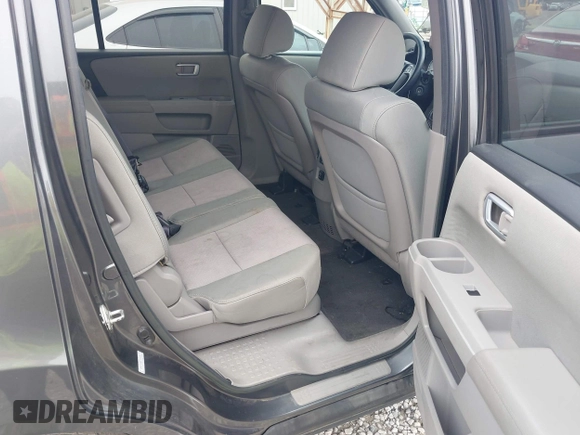 2012 Honda Pilot EX with VIN 5FNYF4H43CB050221, listed as a IAAI auction lot 41961752 with 217,064 mi miles. Bid and sale history available at carsss.com. Image 8.