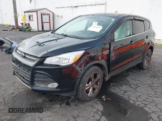 2016 Ford Escape SE with VIN 1FMCU9G97GUA30718, listed as a IAAI auction lot 41516857 with 167,576 mi miles and . Bid and sale history available at DreamBid. Image 2.