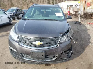 2015 Chevrolet Traverse LS z VIN 1GNKVFEDXFJ134436, wystawiony jako IAAI lot #41773596 z przebiegiem 156 326 mil mil oraz . Historia ofert i sprzedaży dostępna na DreamBid. Obrazek 13.