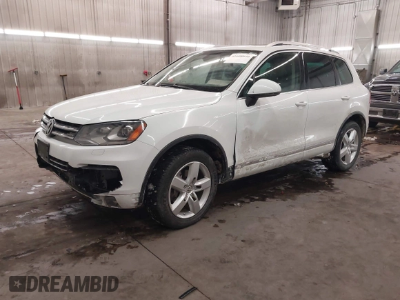 2013 Volkswagen Touareg Lux with VIN WVGEF9BP5DD011511, listed as a IAAI auction lot 41608840 with 167,350 mi miles and . Bid and sale history available at DreamBid. Image 18.