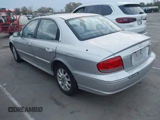2003 Hyundai Sonata GLS with VIN KMHWF35H23A902622, listed as a IAAI auction lot 41914230 with 138,312 mi miles. Bid and sale history available at carsss.com. Image 3.