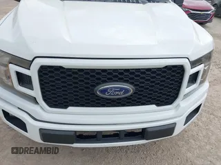 2018 Ford F-150 XL with VIN 1FTEW1C52JKC49228, listed as a IAAI auction lot 42162616 with 148,329 mi miles. Bid and sale history available at carsss.com. Image 12.