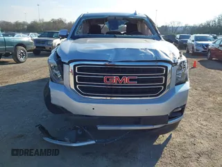 2020 GMC Yukon SLT Standard Edition with VIN 1GKS2DKCXLR294027, listed as a IAAI auction lot 41004965 with 69,161 mi miles. Bid and sale history available at carsss.com. Image 12.